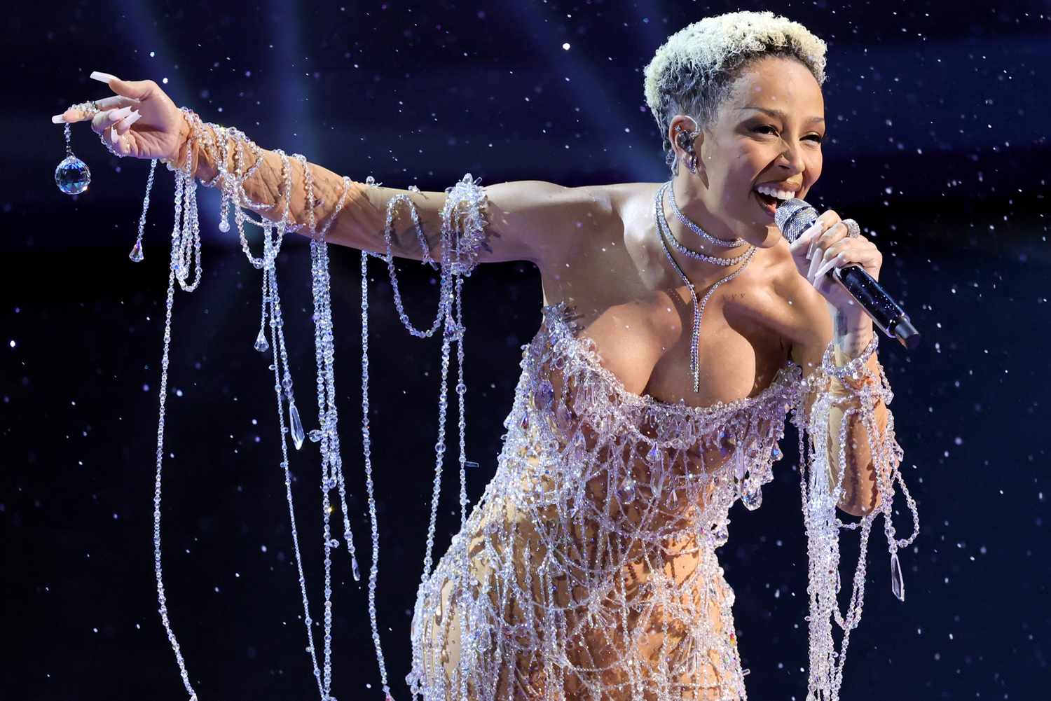 Doja Cat Wows in Naked Dress Dripping in 1 Million Crystals During James Bond Tribute at Oscars 2025