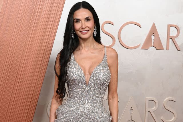 Demi Moore Takes the Plunge in Low-Cut, Crystal-Embellished Gown at Oscars 2025